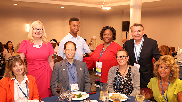 Networking attendees at dinner